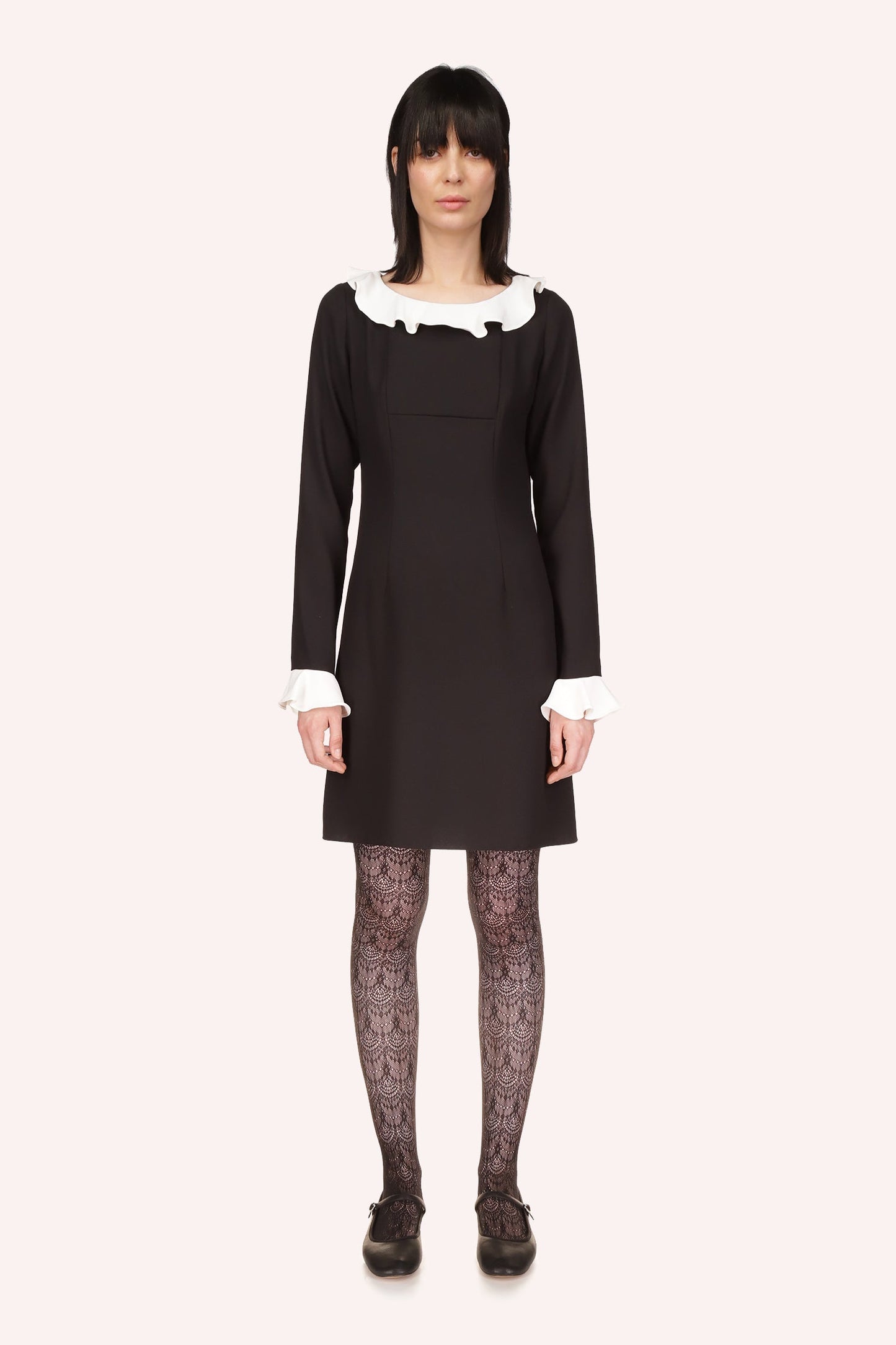 Combo Crepe Dress is above-the-knee dress, vanilla crepe on the long sleeves and collar borders
