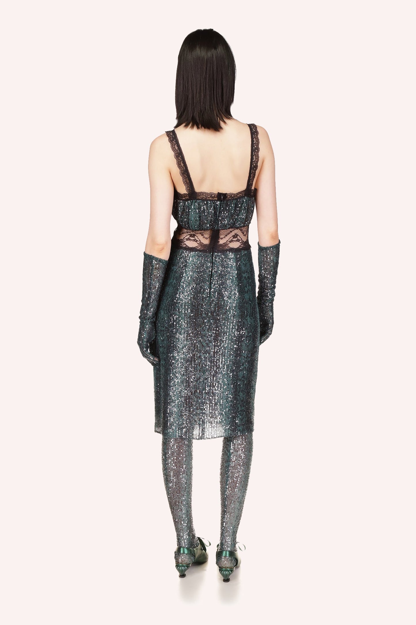 Knee-length dress, low-cut in the back, large waist see-thru black lace, zipper running along spine