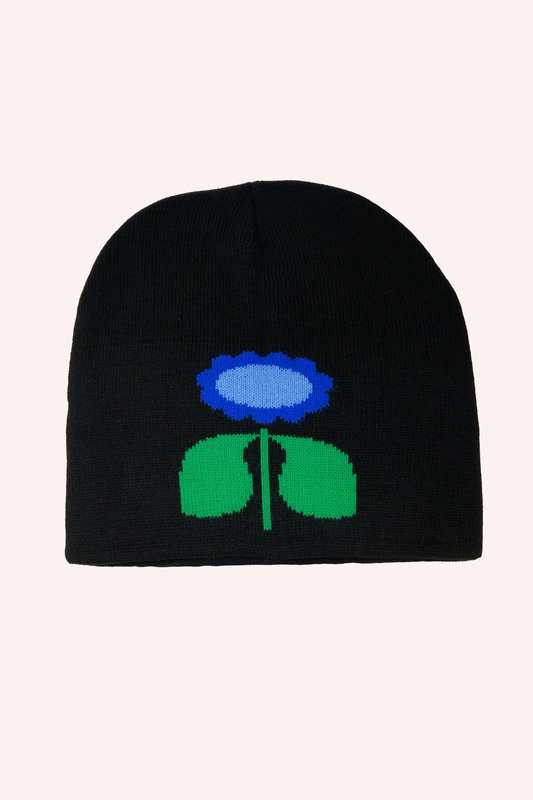 Daisy Beanie is a dark color hat, features a stylized sky blue and light blue daisy with a green stem