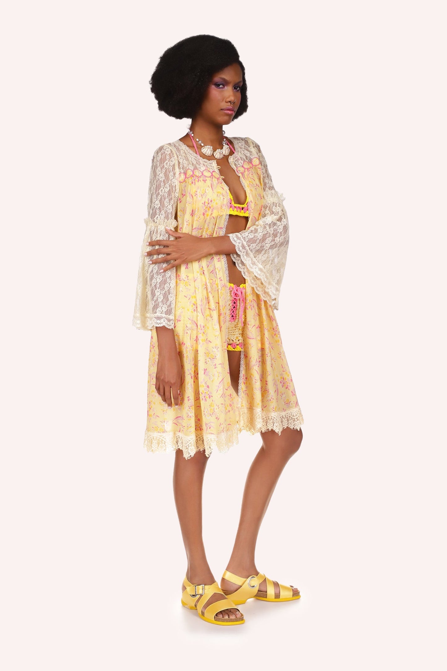 Arcadia Blossom Lace Cover Up is in yellow color, just above knee, and long sleeves