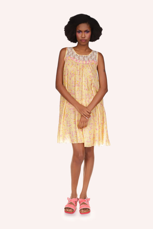 Arcadia Blossom Sleeveless Dress, yellow with red spots, white lace on top and over shoulders.