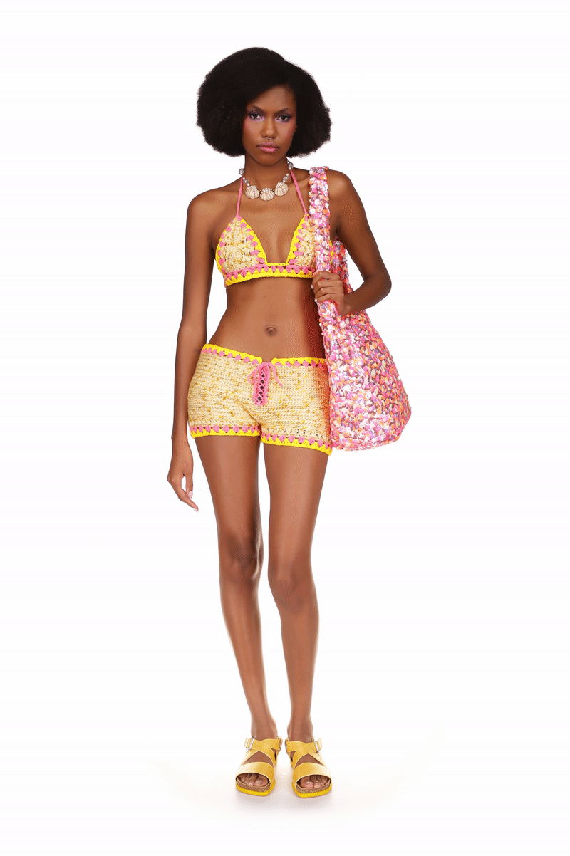 Rivera Crochet Set Marigold, hems are in yellow, Short & top is tied with a pink ribbon. 