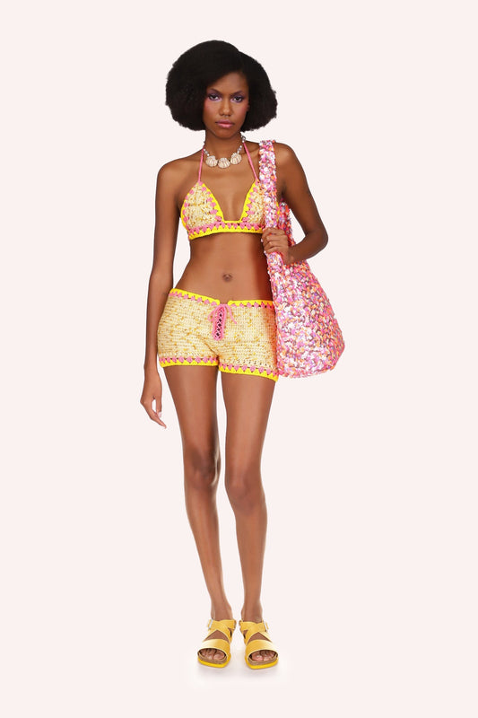 Rivera Crochet Set Marigold, hems are in yellow and pink, Short is tied with a pink ribbon.