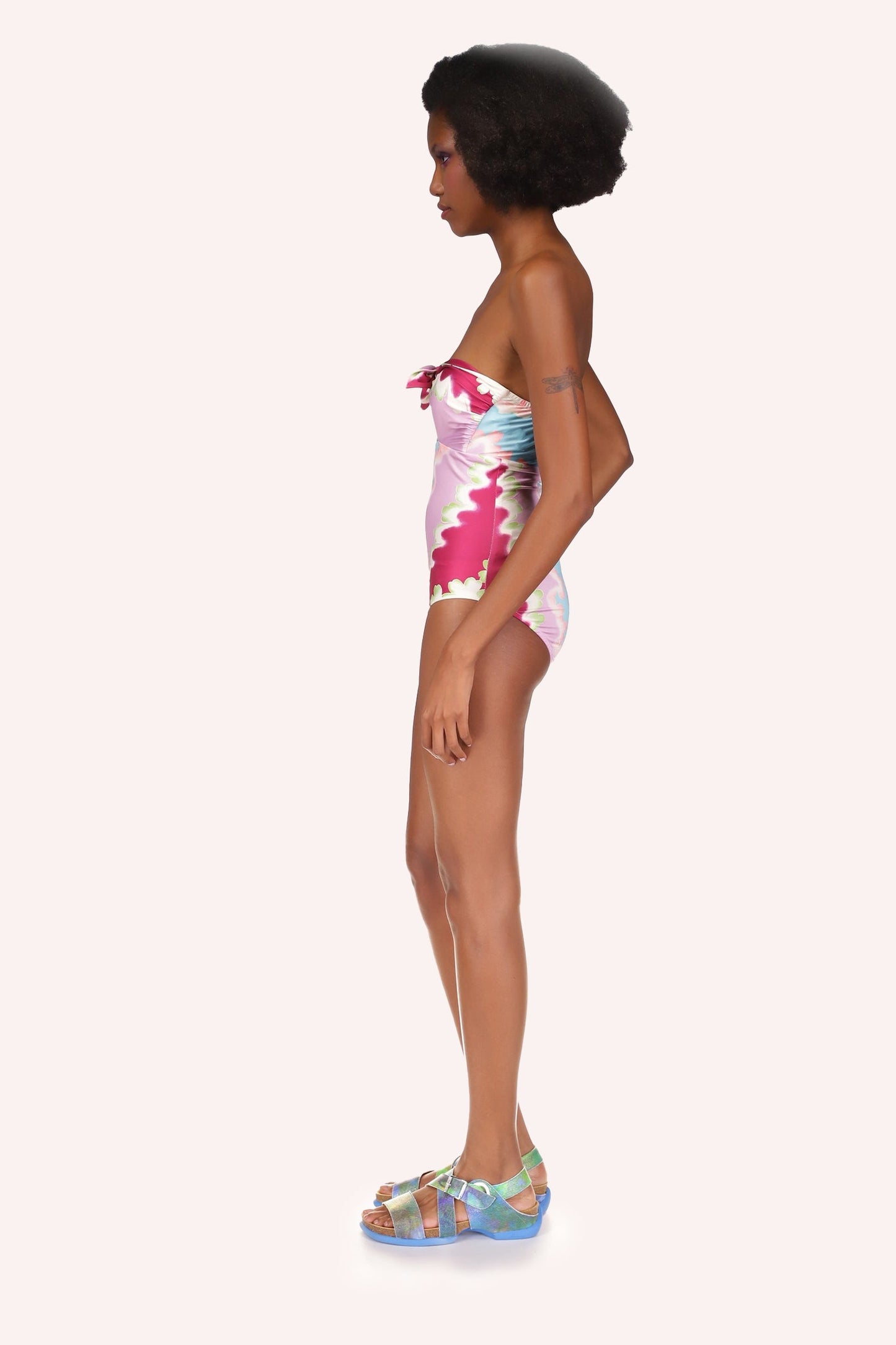 In a stretch fabric, full Bathing Suit wavy lines cloudy design, Feels and fits like a second skin