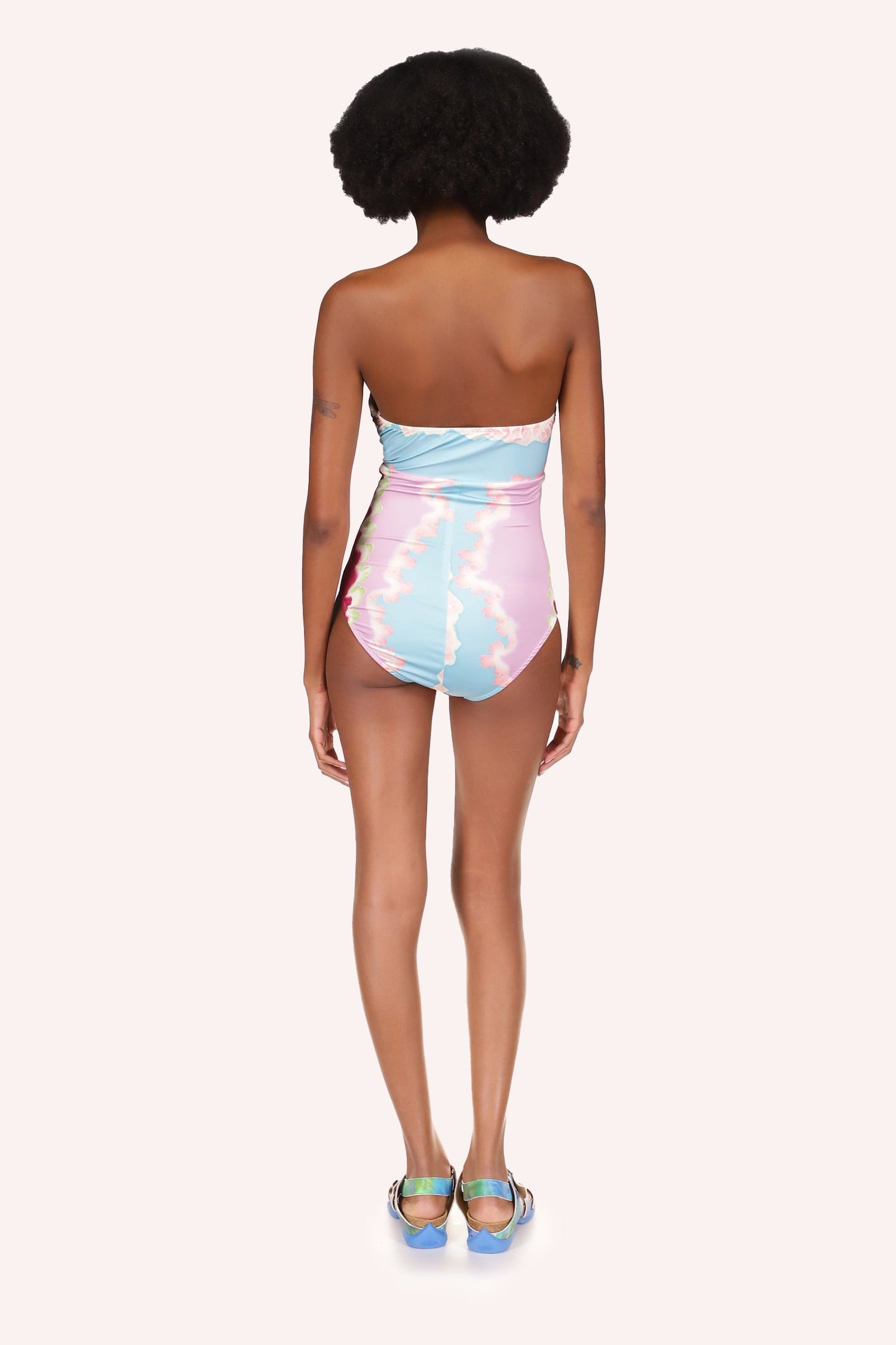 Bathing suit is in stretch fabric, Multi-colored wavy lines cloudy design, fits like a second skin