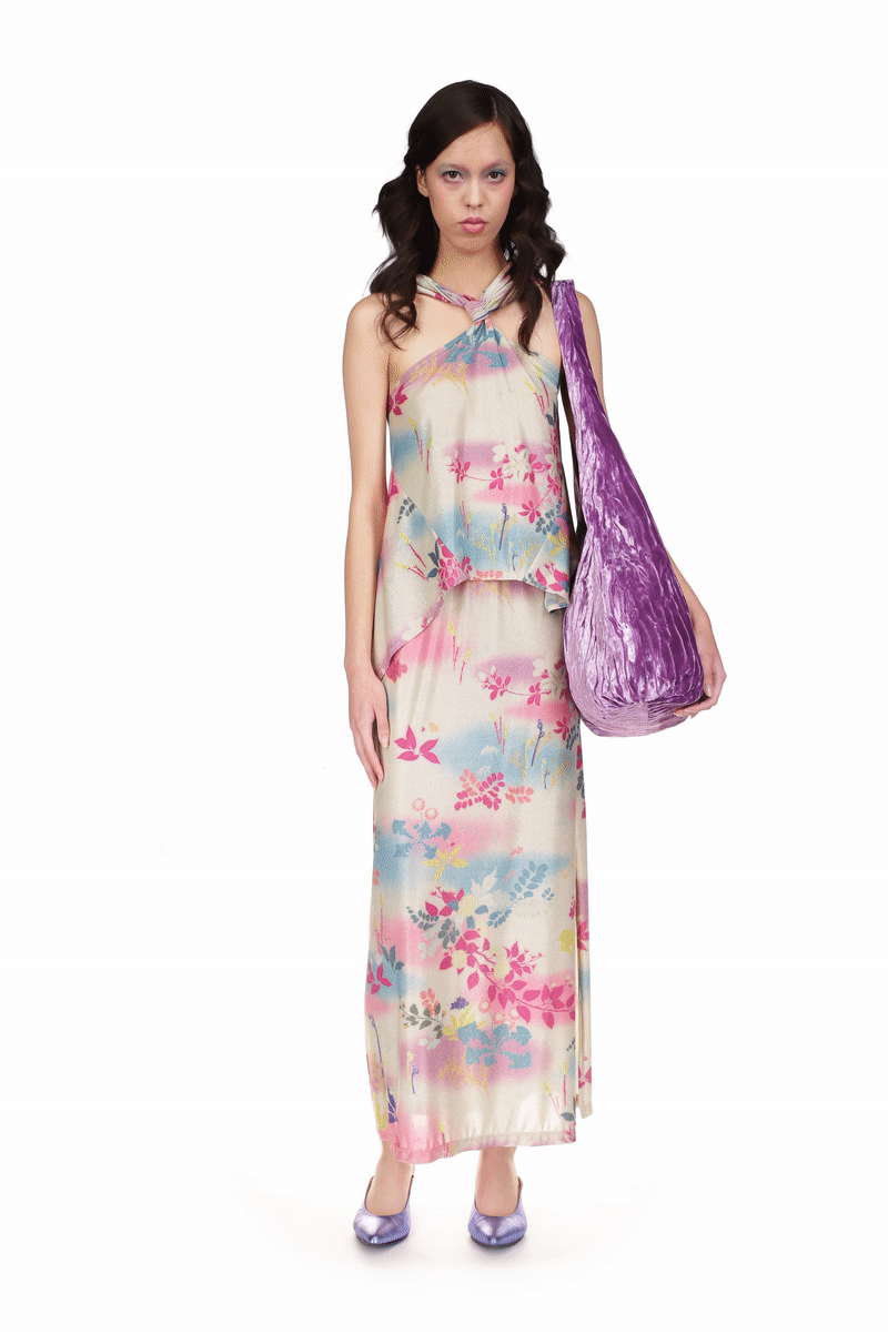 Atlantis Garden Maxi Skirt has a slit on the left side from mid-calf to ankle