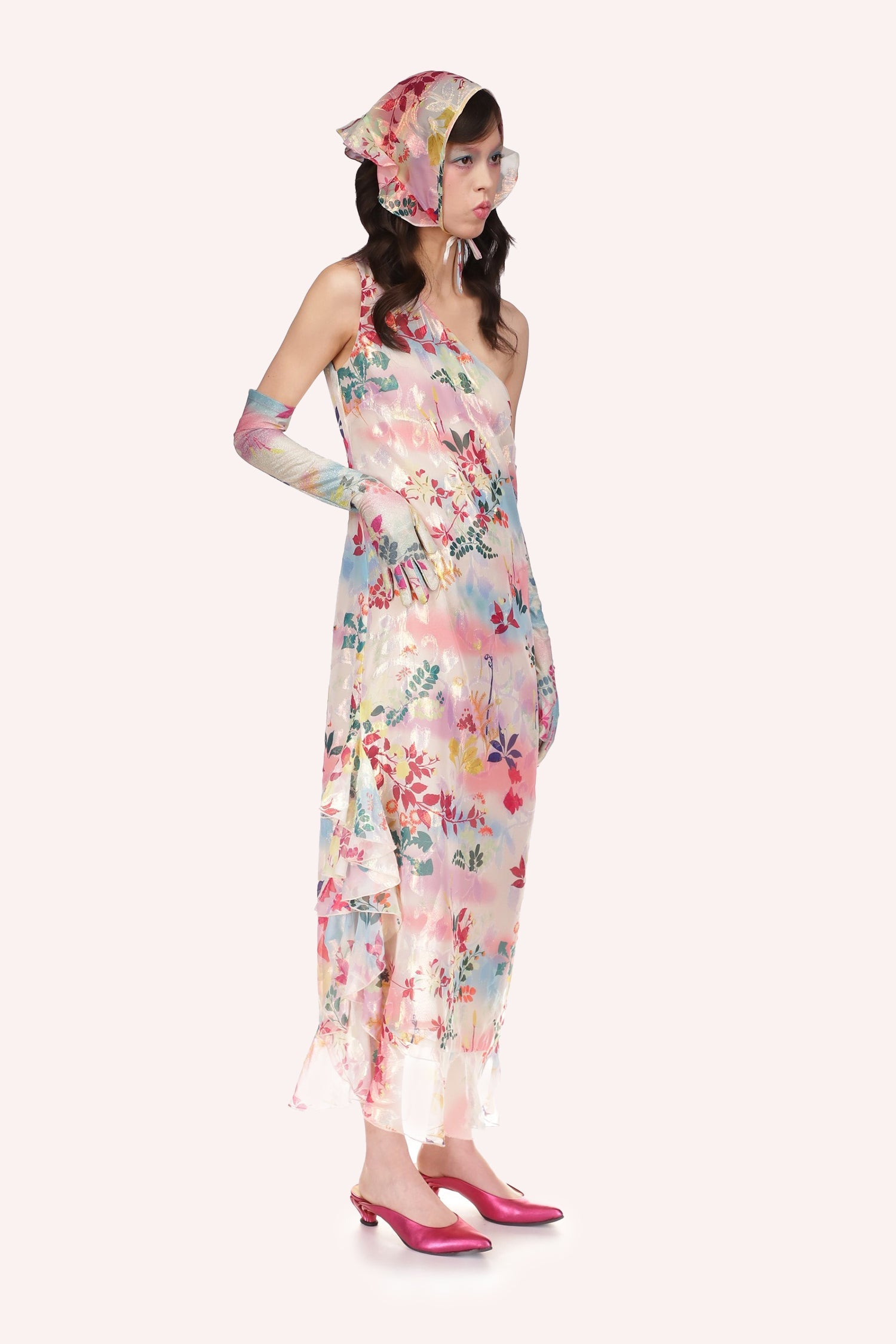 Atlantis Garden Asymmetrical Gown, a ruffle effect adorned the right side from mid-calf to ankle.