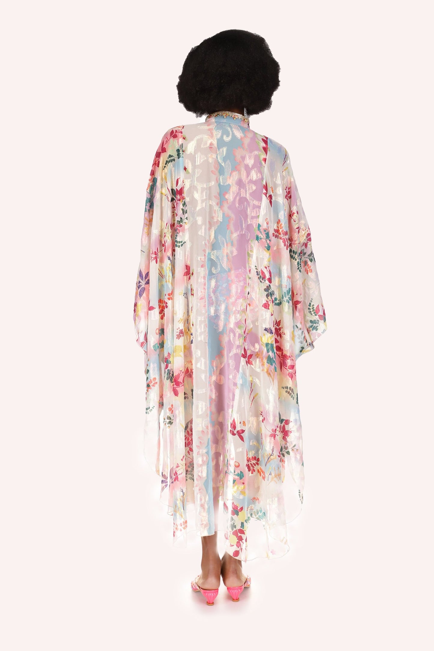 The overall shape of Atlantis Garden Kaftan is triangular, with a nice floral design
