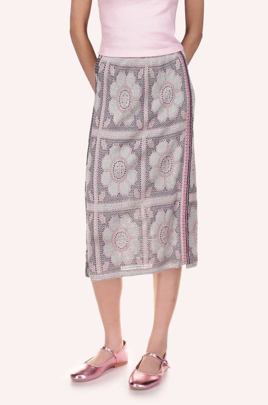Opalescent Knit Skirt is in grayish color with large squares  with circle inside pattern