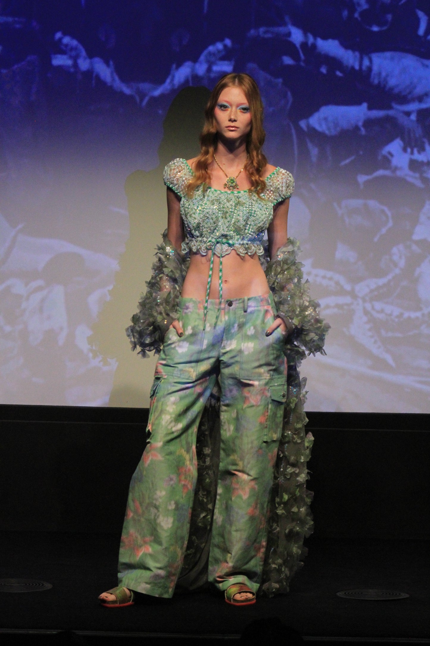 On runway, Green Cargo Pants, pink floral design, 2-pockets front & side flapped patch pocket.