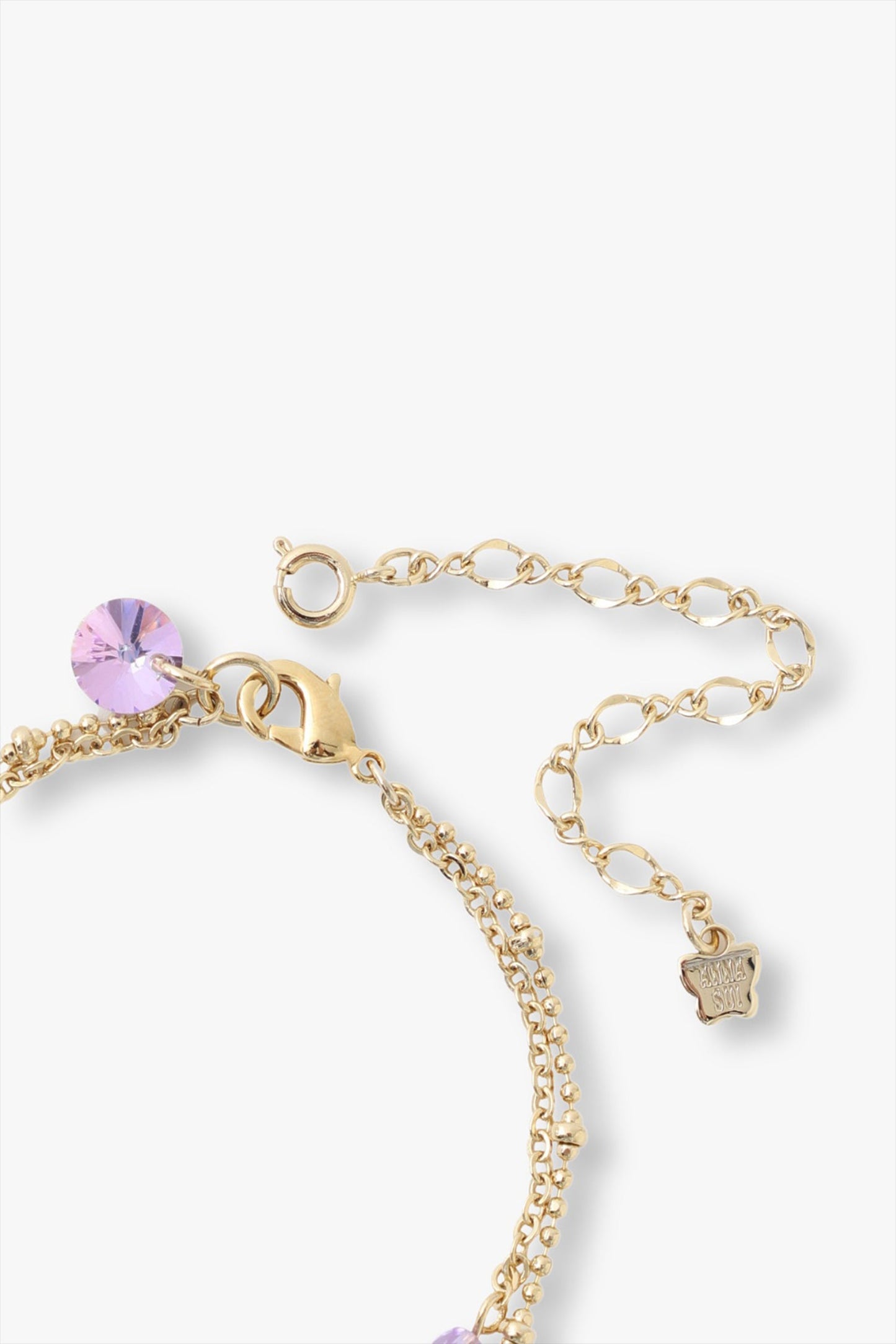 A lobster claw clasp with large links for adjustability, Anna Sui imprint on a tag, this part can be add or removed