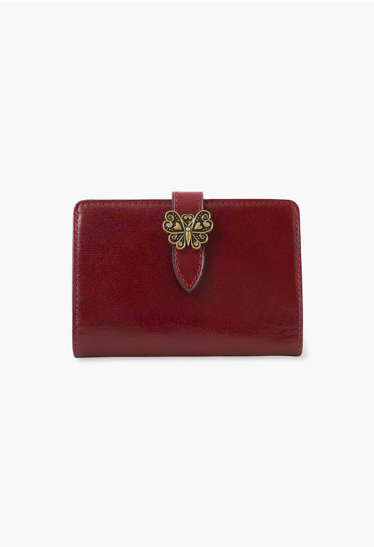 Small Roger Wallet wine leather finishes, signature Anna Sui butterfly hardware on the wallet flap