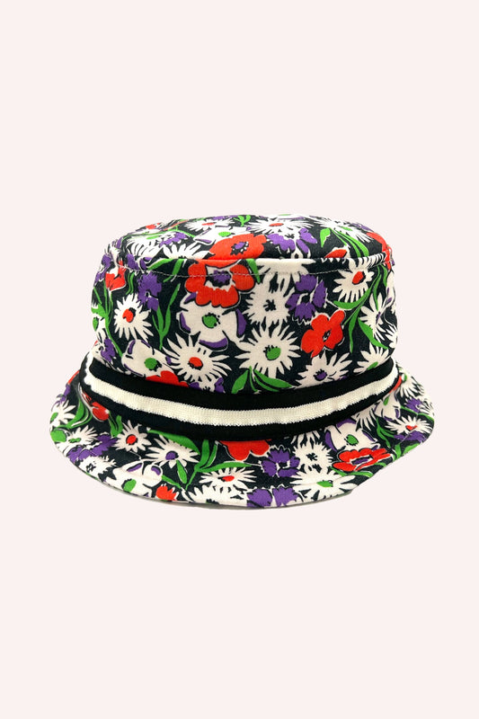 Bucket Hat, red and white Daisies, green leaves, black background, black and white strip around