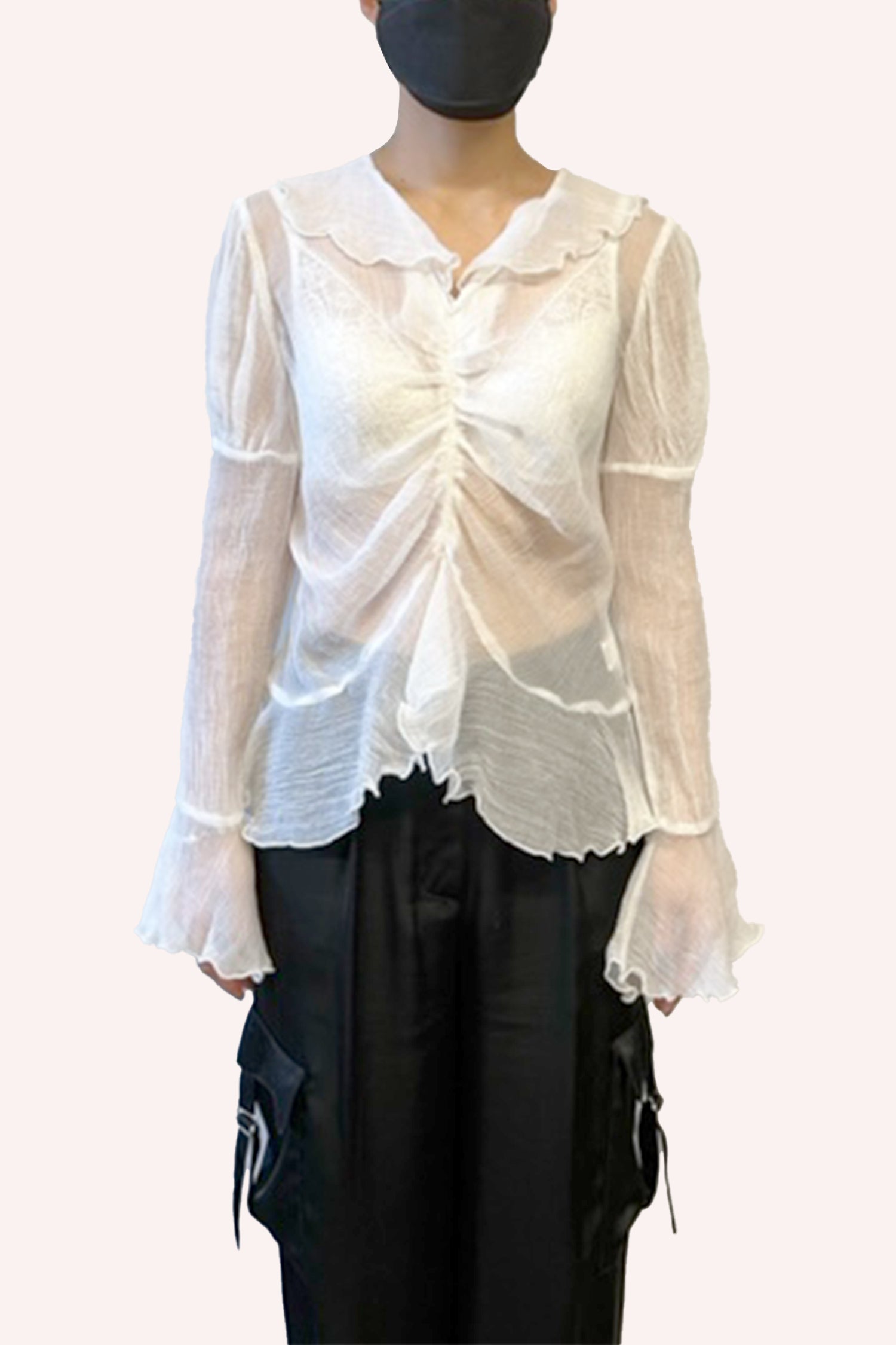 Crinkle Chiffon Blouse White is transparent, with a ruffle effect that rises under the bust