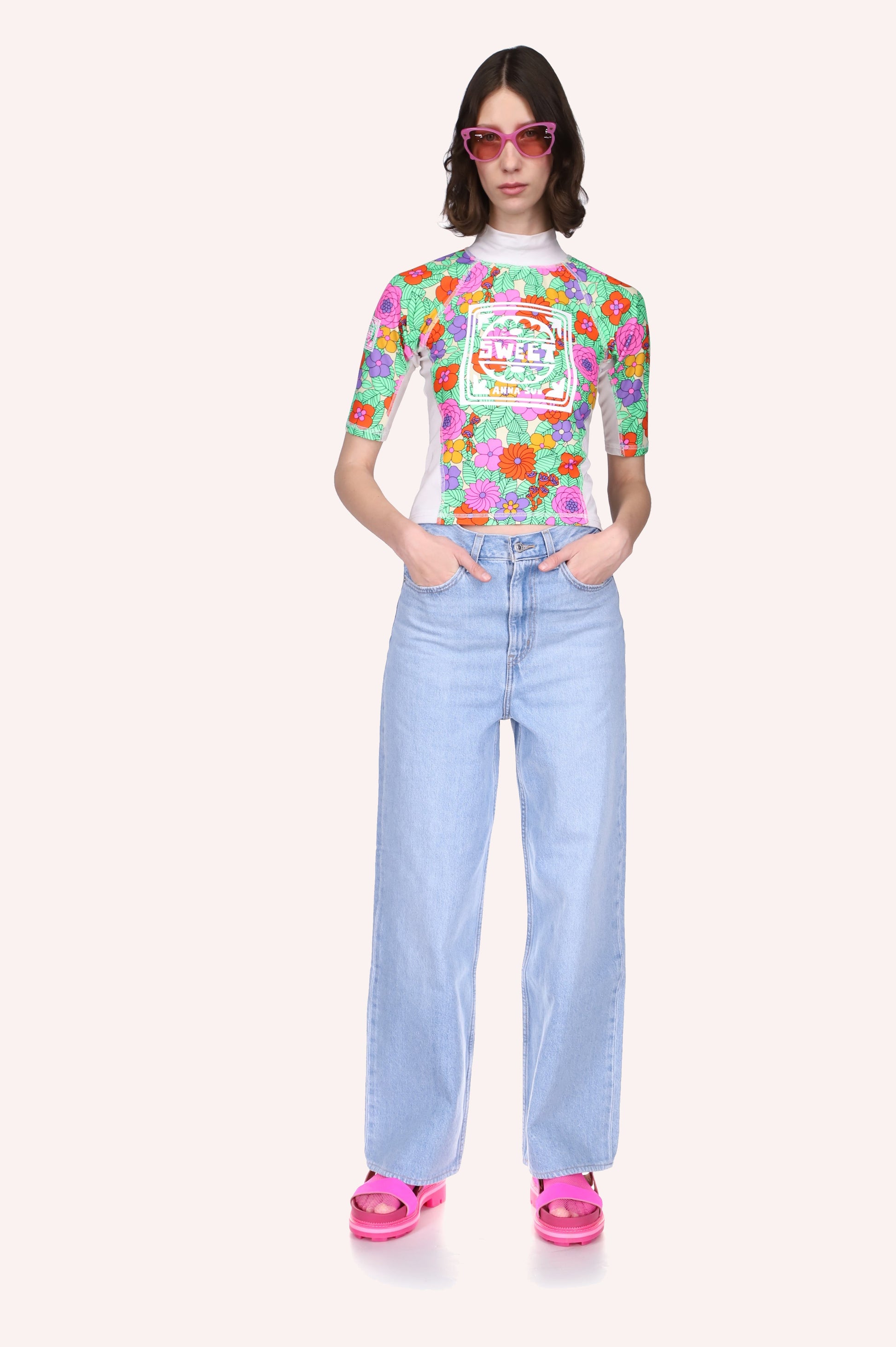 Floral design of marigold, a white band on each side goes on the back in a rounded shape