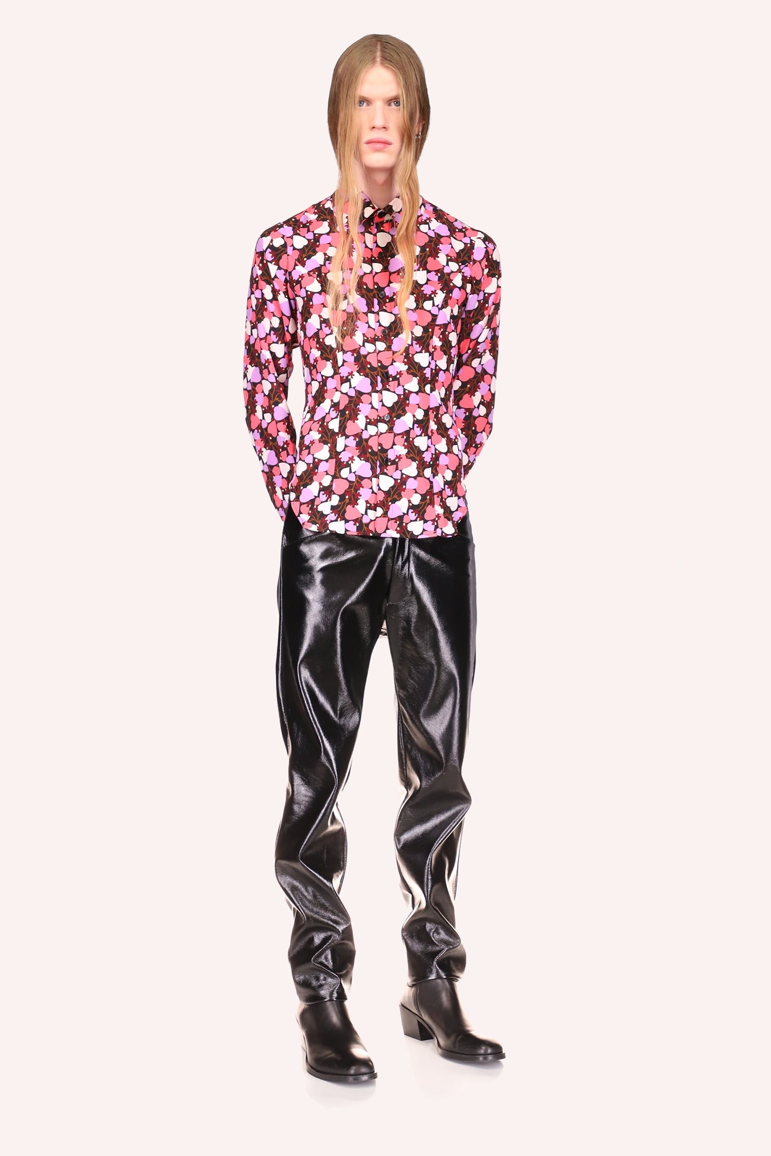 long sleeves buttoned shirt, pattern of white, pink heart on dark background, collar at neckline