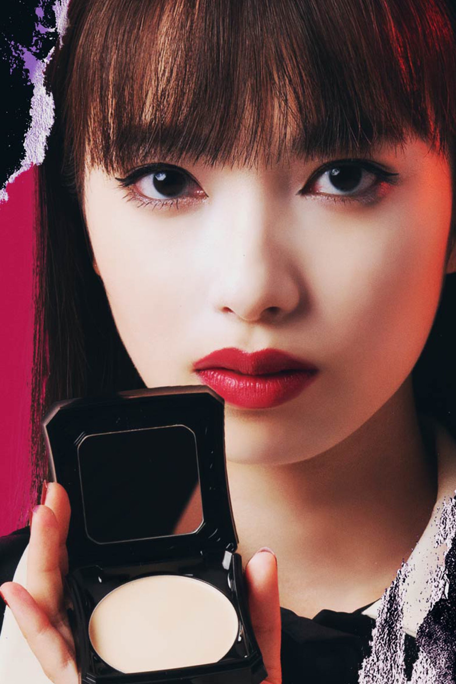 FAIR foundation is in a black container with powders & mirror, creates a flawless doll-like look