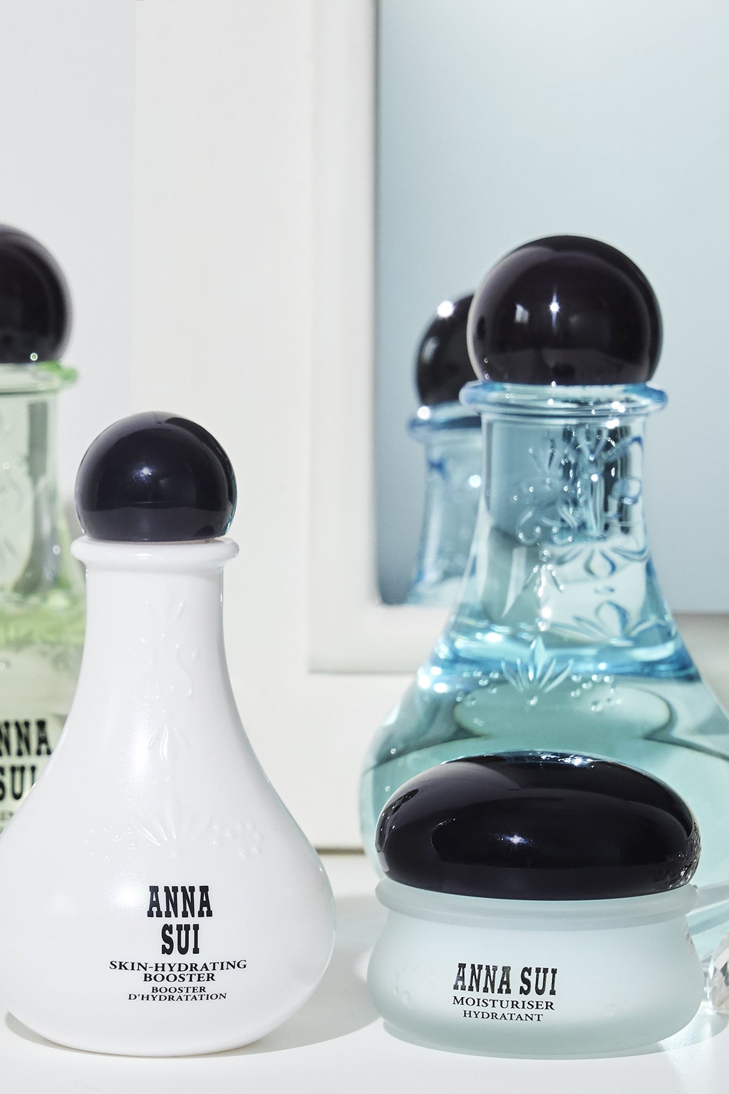 Skin-Hydrating Booster, Anna Sui Moisturizer Hydratant, decorating bottle, in a bathroom décor