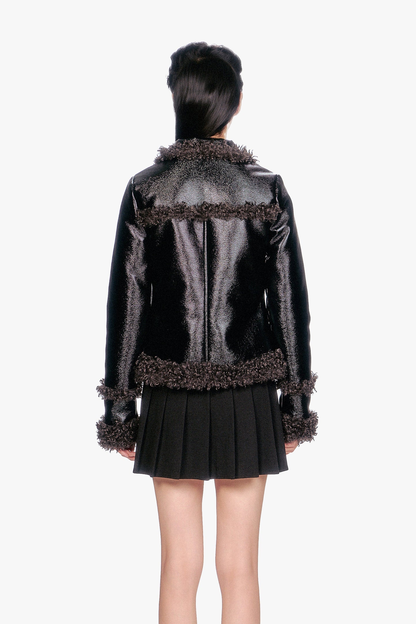 Faux Leather W/Curly Lamb Trim Jacket at hems, long sleeves a seam divides the back into two panels