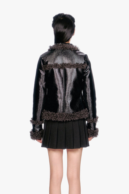 Faux Leather W/Curly Lamb Trim Jacket at hems, long sleeves a seam divides the back into two panels