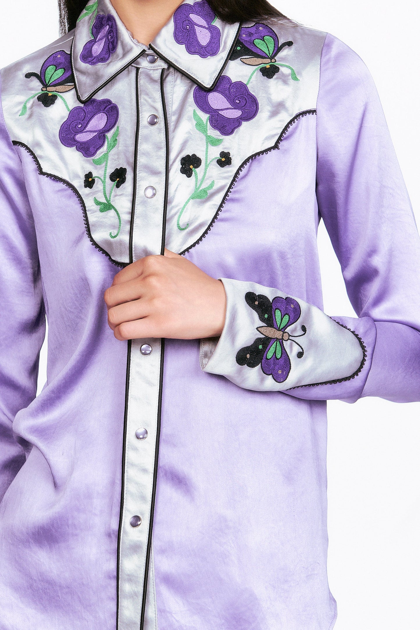 Detail of Lilac Boudoir Satin wavy Floral Embroidered on front and a light purple on button line