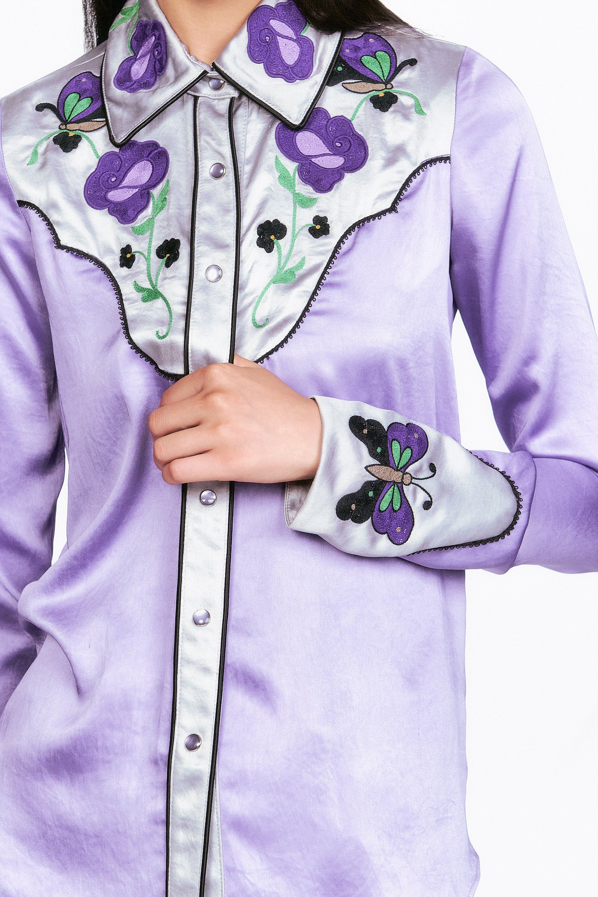 Detail of Lilac Boudoir Satin wavy Floral Embroidered on front and a light purple on button line