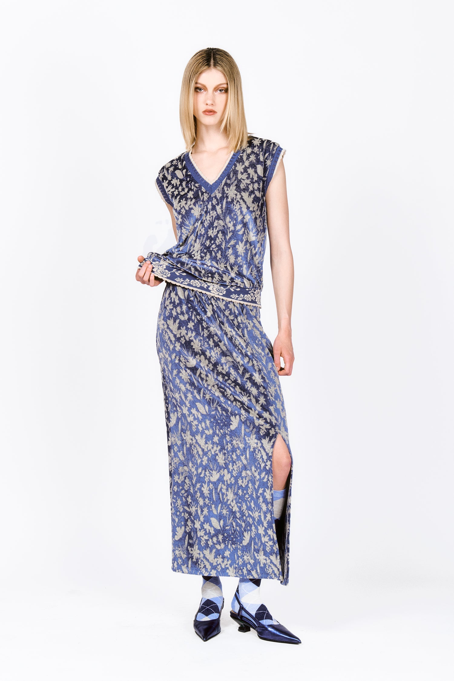 The Bluebell Velour Maxi Skirt off-white floral design paired with Bluebell Velour Vest