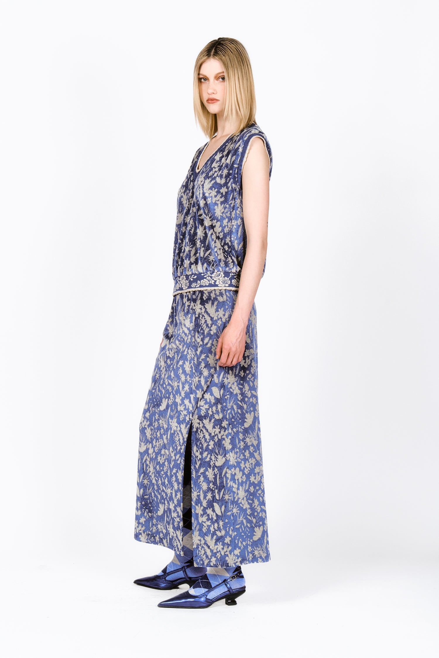 The Bluebell Velour Vest, off-white floral paired with Bluebell Velour Maxi Skirt with Slit