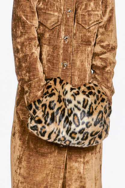 Faux Leopard Muff, animal-friendly fabric, it’s a cozy and glamorous accessory for chilly days.