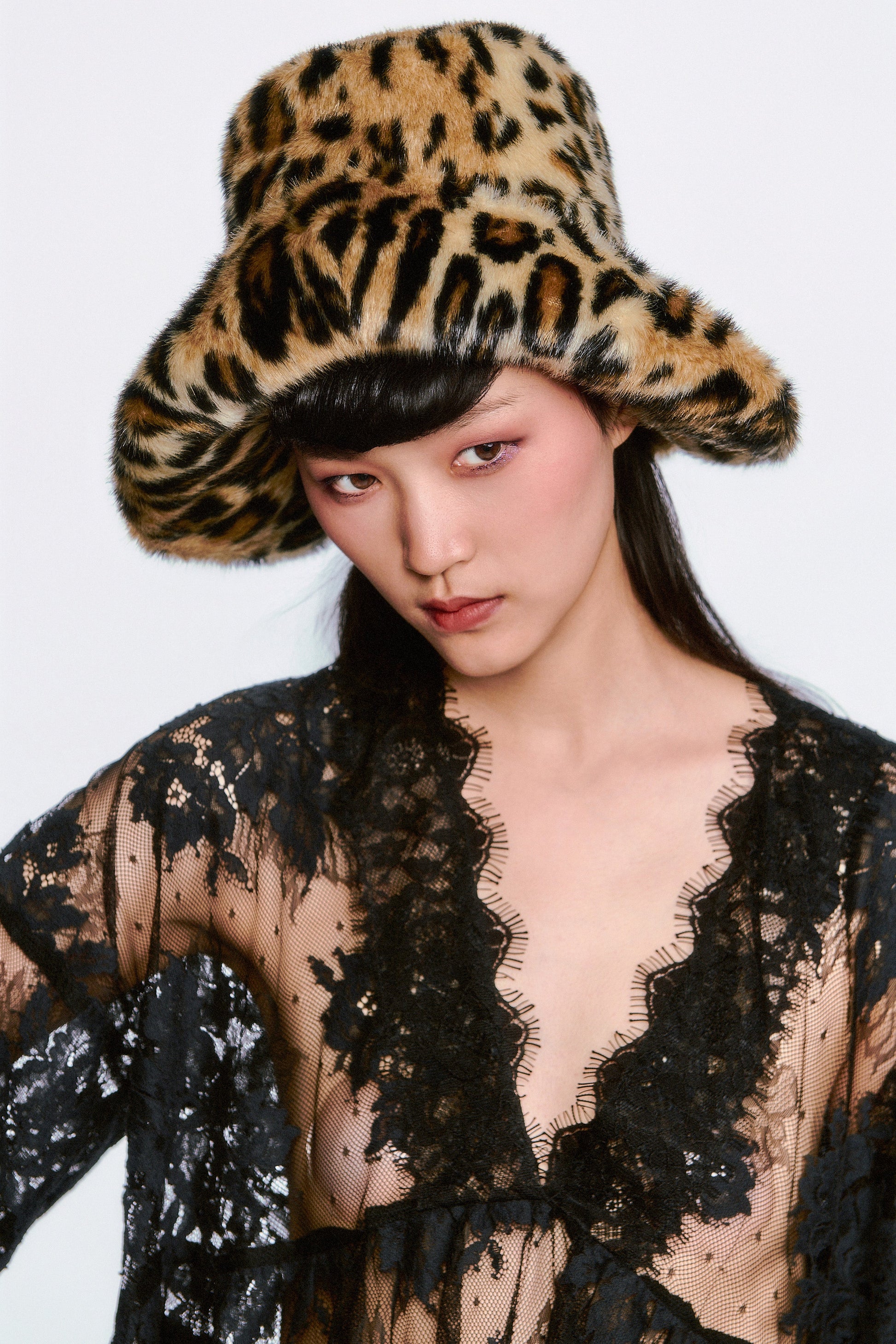 Leopard Hat, it's the perfect statement piece to top off any cold-weather look with style and warmth.