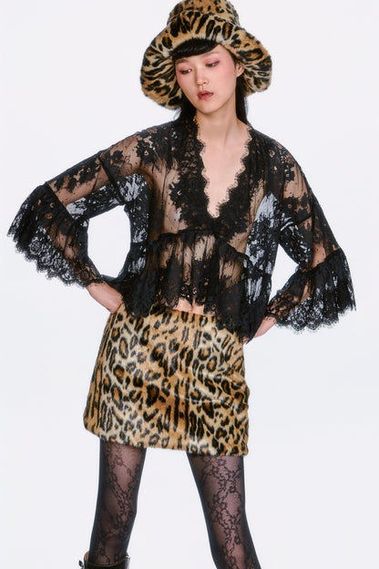 The Faux Leopard Mini Skirt Perfect for adding a statement edge to both casual and dressed up looks.