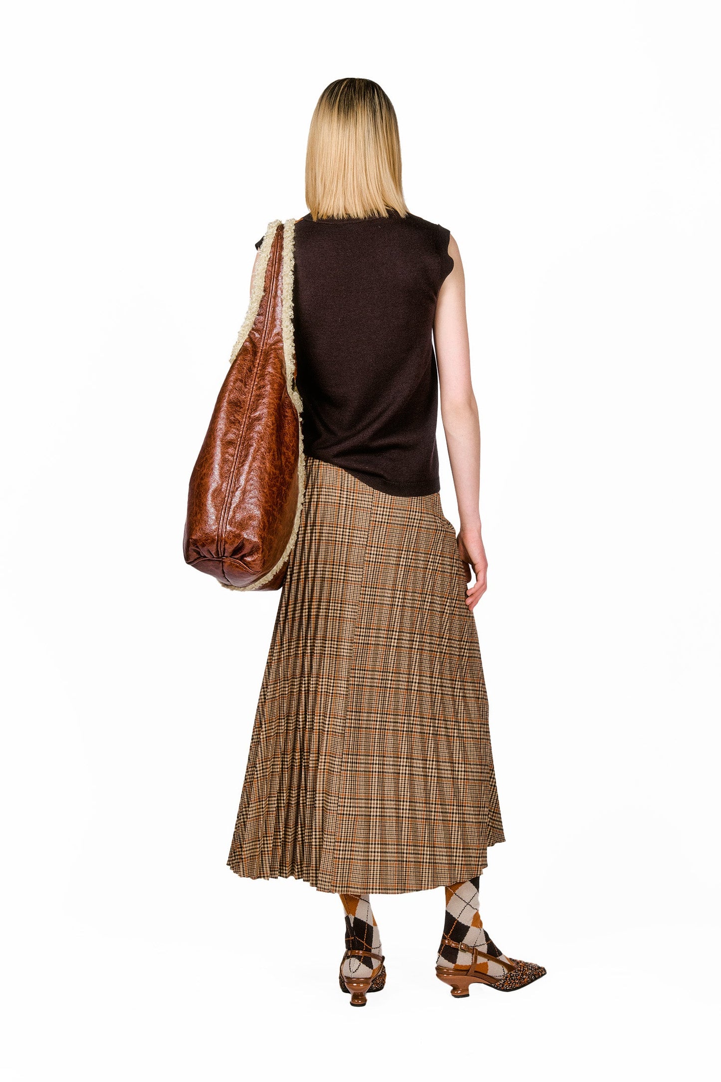 Argyle Knitwear Vest, back is plain dark brown, can be wear loose too above a skirt