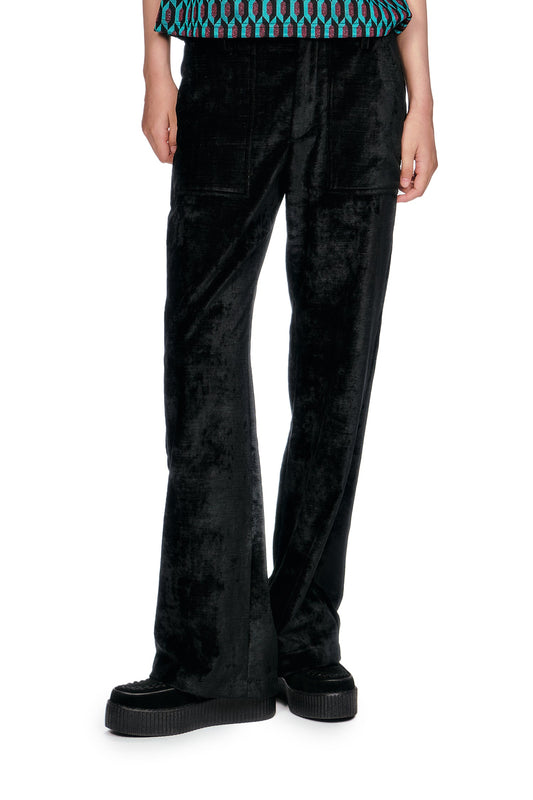 Velour pants with a relaxed fit, practical pockets, perfect for everyday wear with a touch of style.