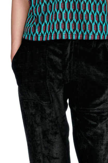 Black Velour pants with a relaxed fit, practical side pockets, zipper on front.