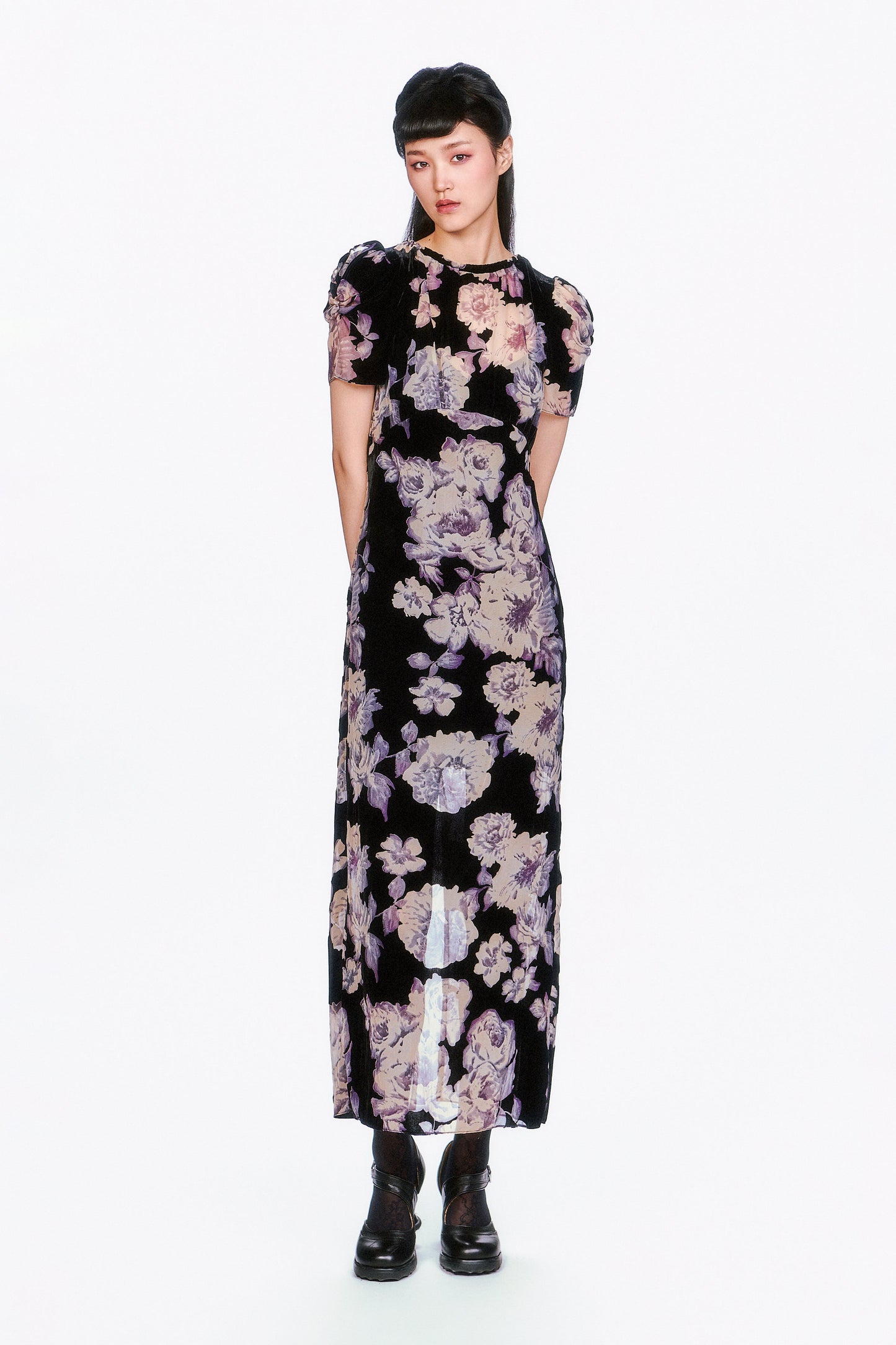 Simple and Sweet, the Cabbage Rose Devoré Maxi Dress features a floral pattern and a loose, tailored fit. 