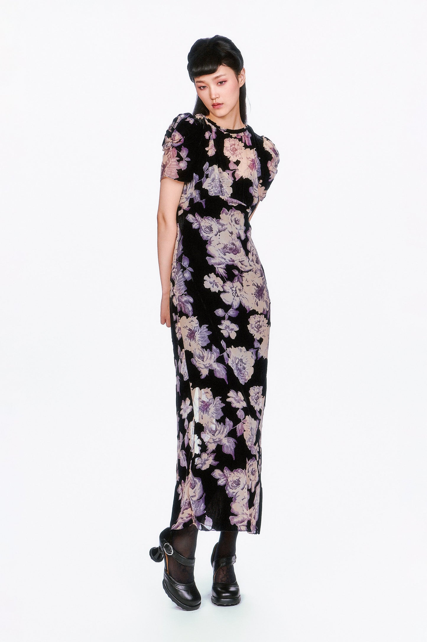 Simple and Sweet, the Cabbage Rose Devoré Maxi Dress features a floral pattern and a loose, tailored fit. 
