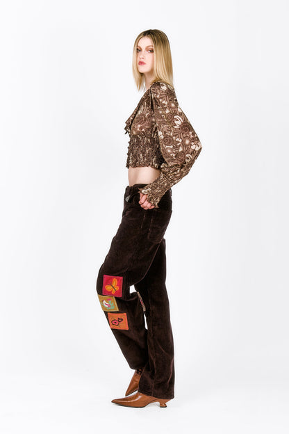 Bloomsbury Buds Lurex Knit Smocked Top paired with Embroidered Velveteen Patched Corduroys