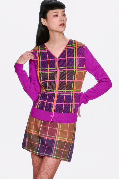 Person wearing Long Sleeves Plaid Cardigan – Magenta intersecting lines in green, pink and orange. 