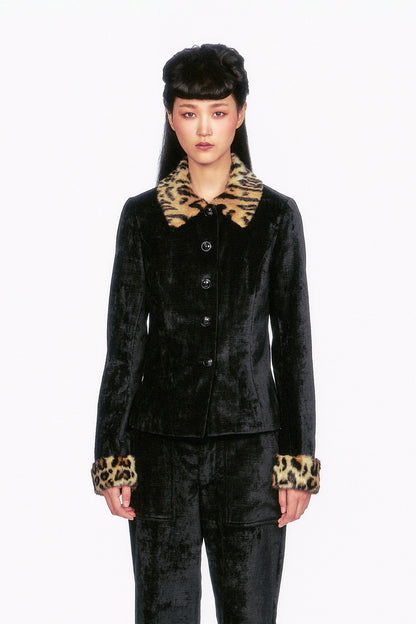 FALL-2025-20 Velour Jacket
The Velour Jacket black, 5-buttons, featuring faux fur leopard accents on the collar and cuffs.
