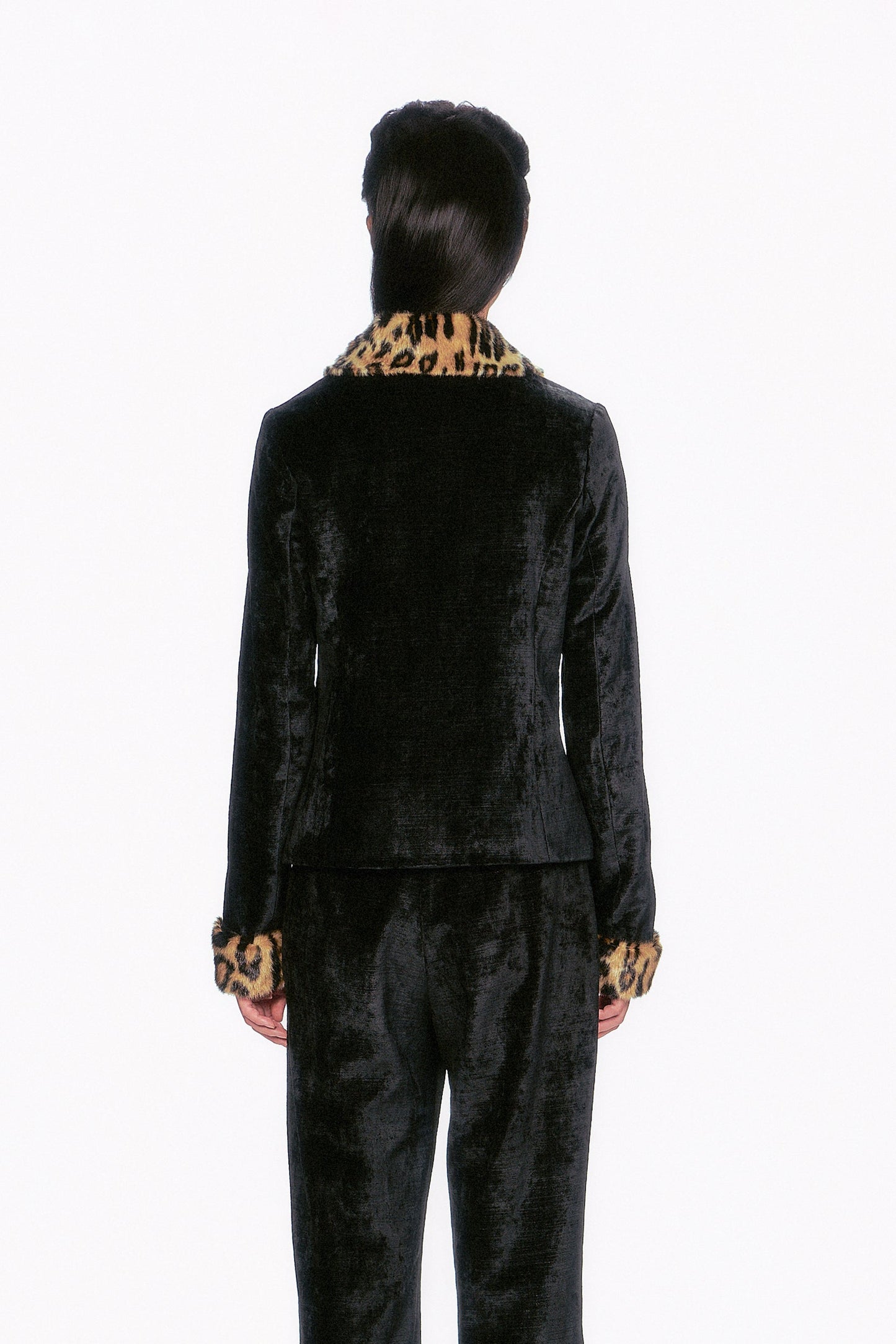 Perfect for layering from the back, it effortlessly adds a touch of sophistication and flair to any outfit.