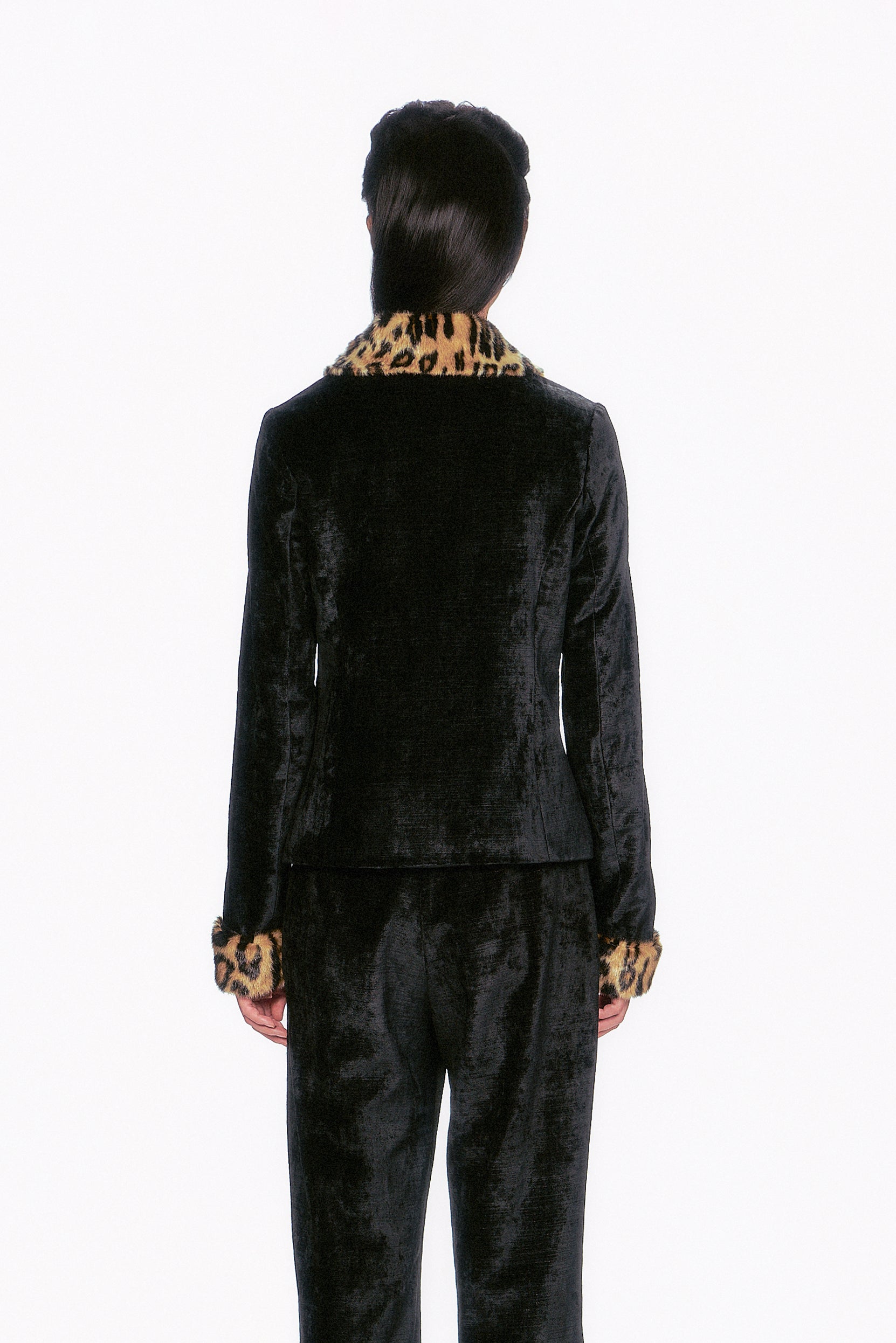 Perfect for layering from the back, it effortlessly adds a touch of sophistication and flair to any outfit.