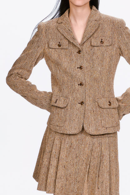 Herringbone Jacket a wardrobe essential that effortlessly elevates both professional and casual looks.