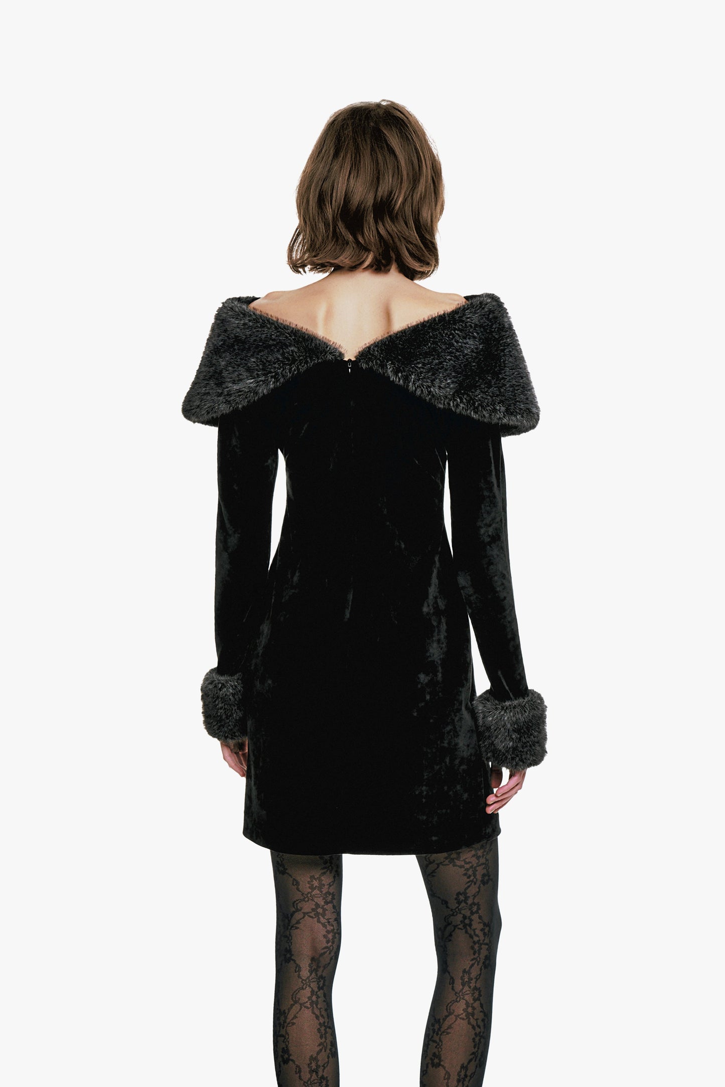 Stretch Velour Dress Designed with faux fur trim along the shoulders, v-cut collar on the back.