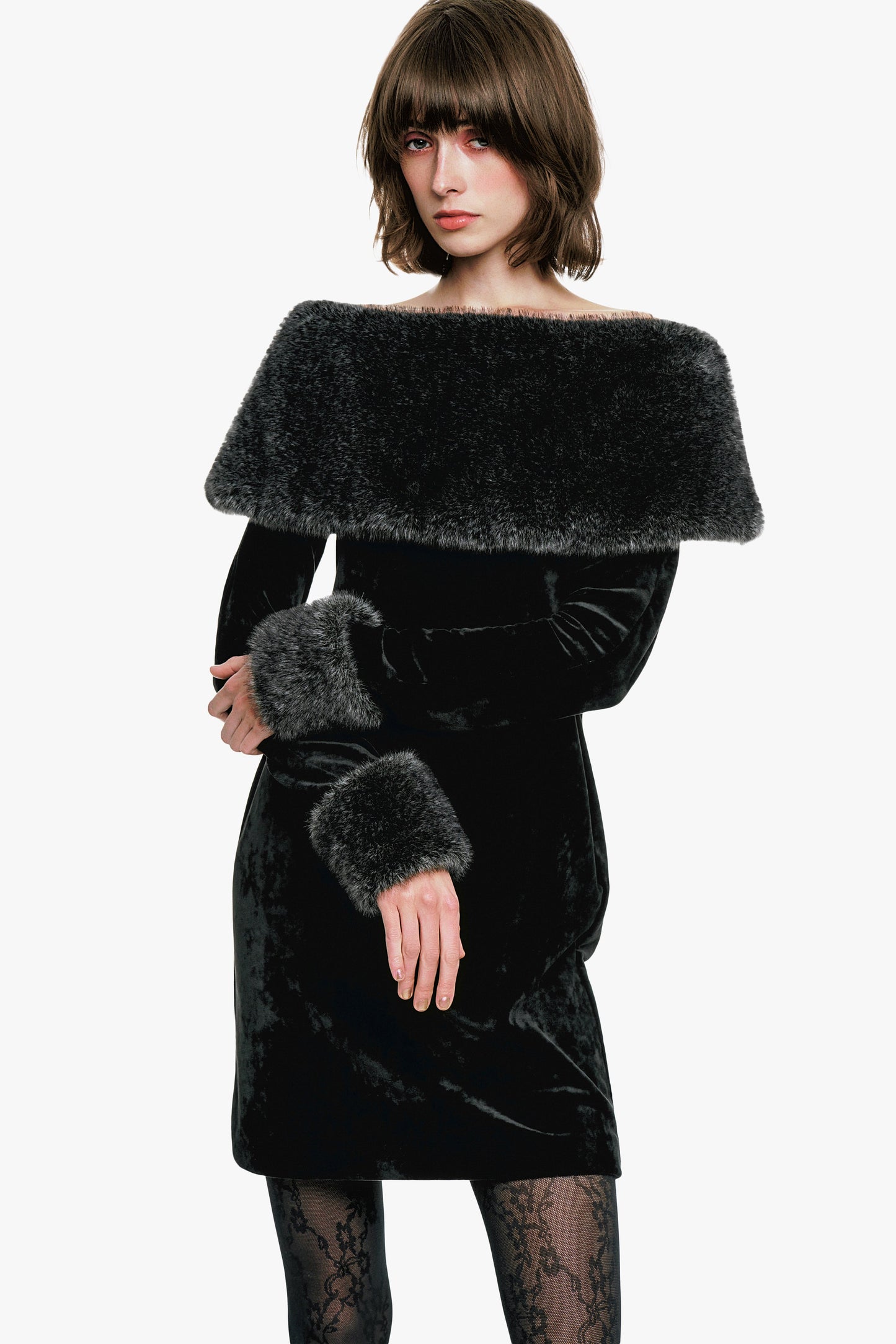 Stretch Velour Dress Designed with an off-the-shoulder neckline, the mini dress is beautifully black