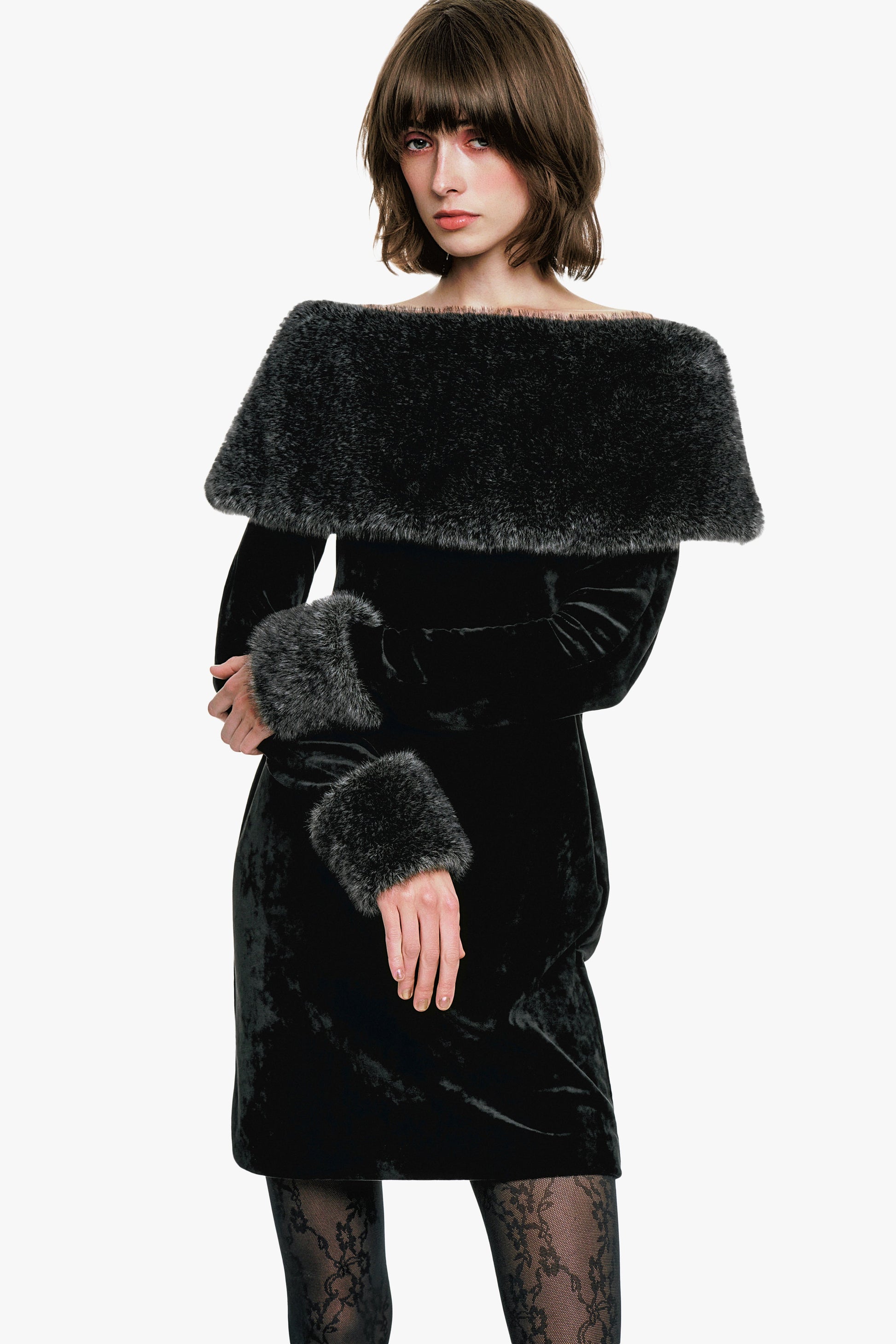 Stretch Velour Dress Designed with an off-the-shoulder neckline, the mini dress is beautifully black