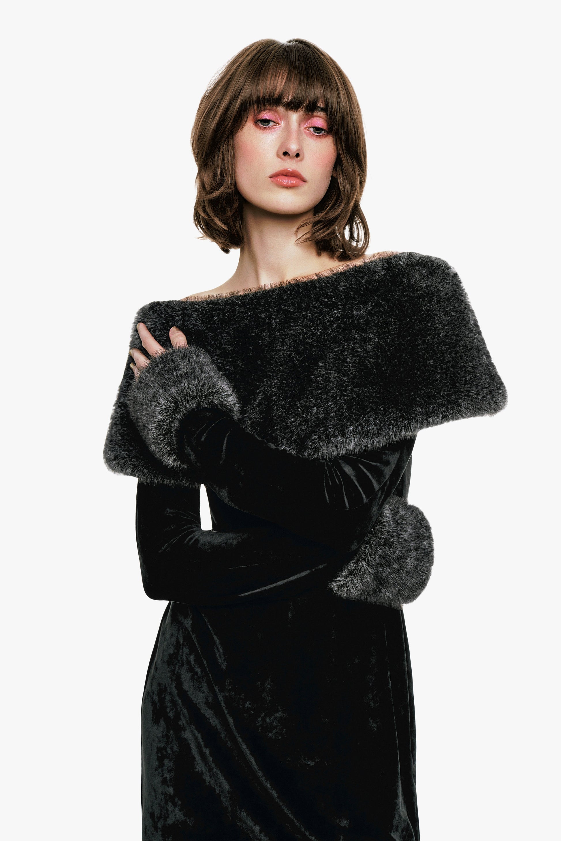 Stretch Velour Dress Designed with faux fur trim along the shoulders covers the bust.