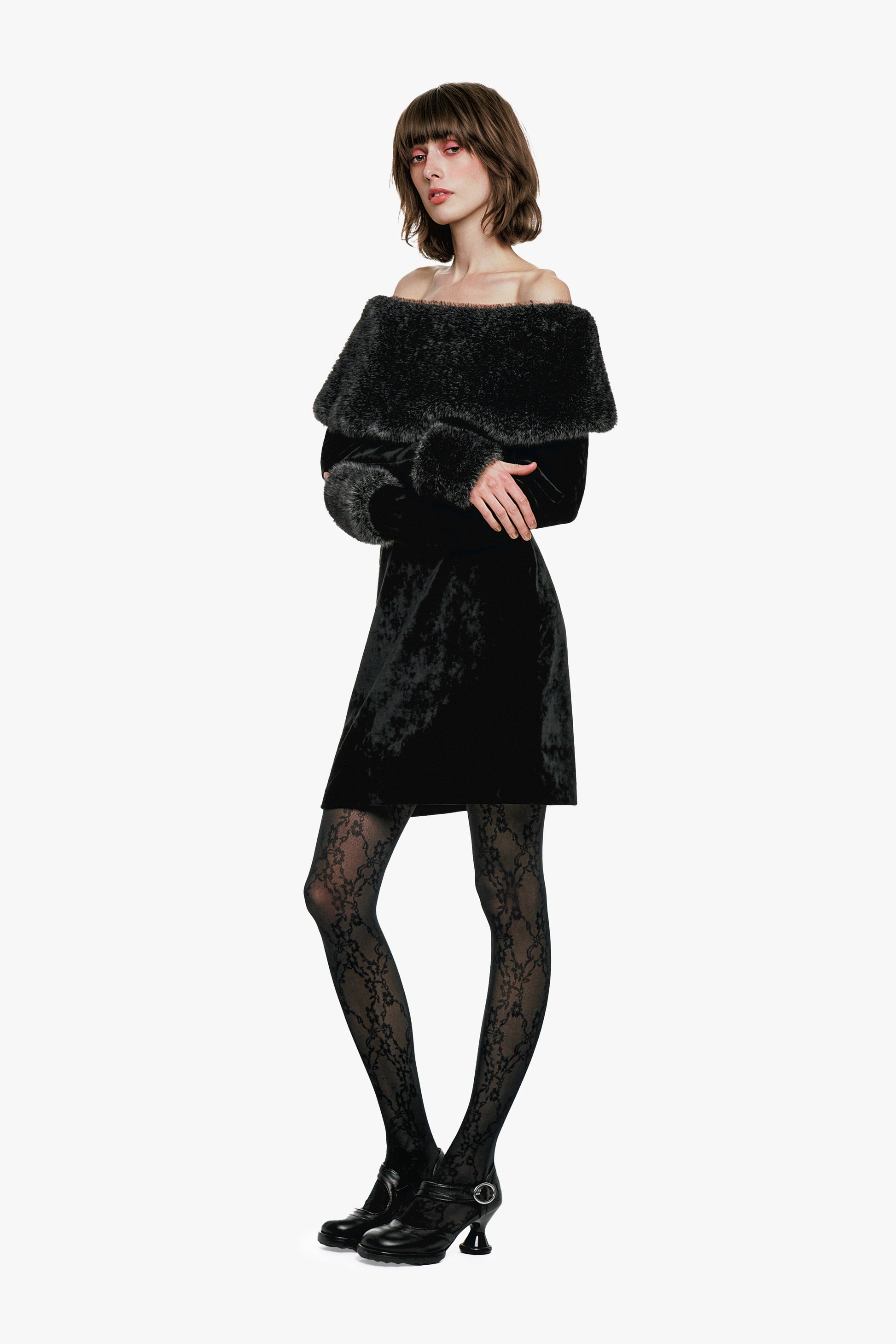 Stretch Velour mini Dress Designed with faux fur trim along the shoulders and cuffs.