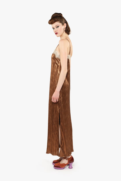 Pleats Lace Slip Maxi bronze Dress sleeveless featuring a textured pattern, a side slit from knees down.