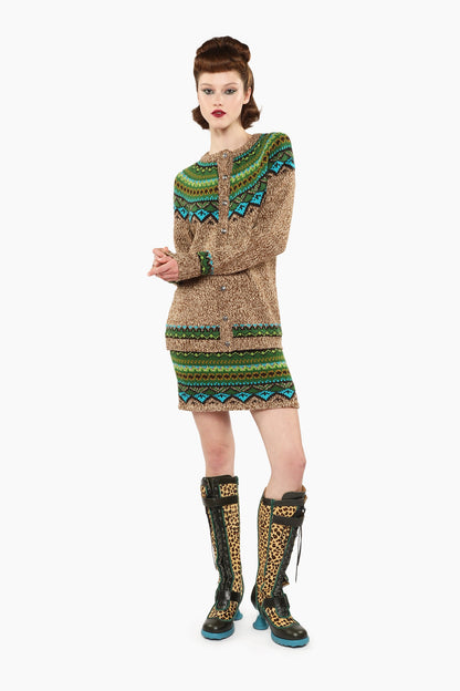 Fair Isle Cardigan, Teal wears with same pattern hue of green and blue triangles mini skirt and boots.