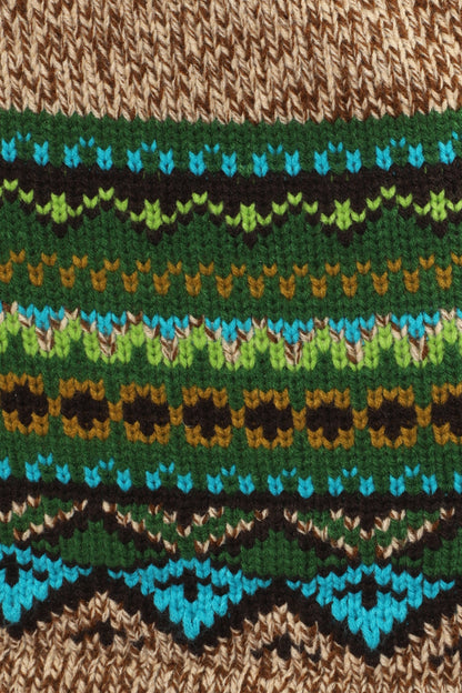 Detail of Fair Isle Mini Skirt – Teal pattern hue of green lines and blue triangles with black border.